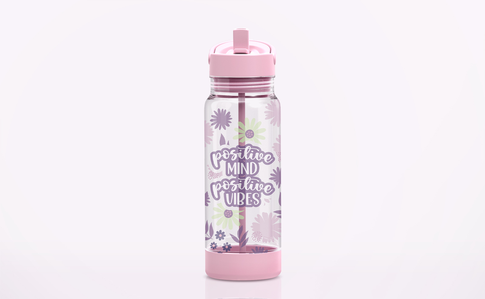 A clear water bottle with floral patterns and the message "Positive mind, positive vibes".